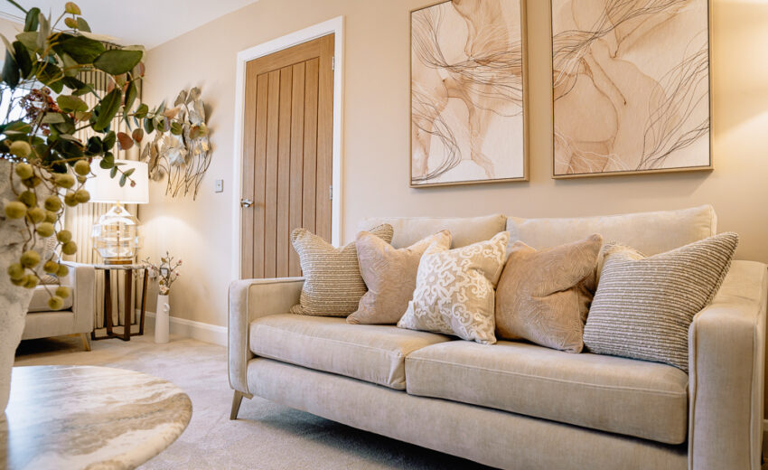 New build living room with sofa and feature chair.