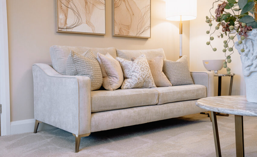 Modern living room with a comfy sofa - Pickstock Homes