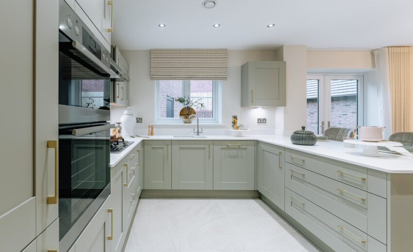 New build kitchen with integrated cabinets and island.