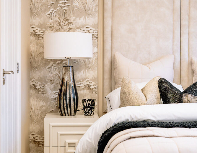 Styled bedside table and decor in a new build bedroom.
