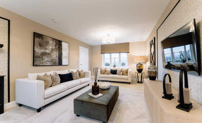 New build living room with sofa and coffee table.