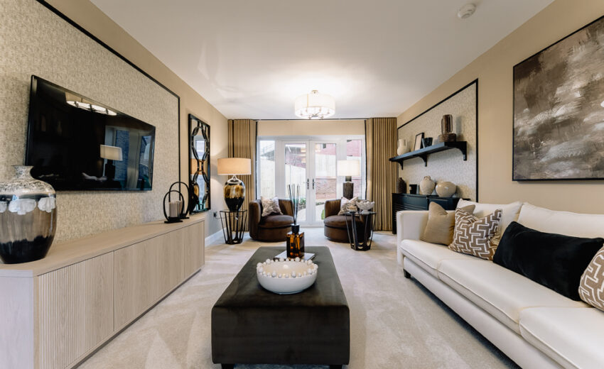 New build open-plan living room with media unit.