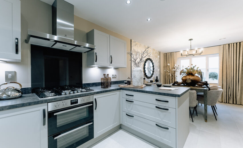 Contemporary fitted kitchen with integrated oven in the Stretford new build.