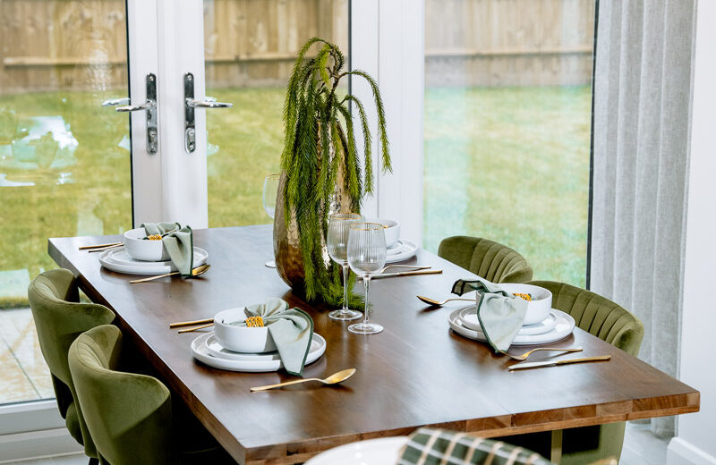 New build dining table with decorative styling.
