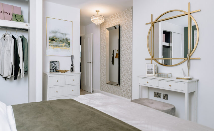 New build dressing area with mirror and storage.